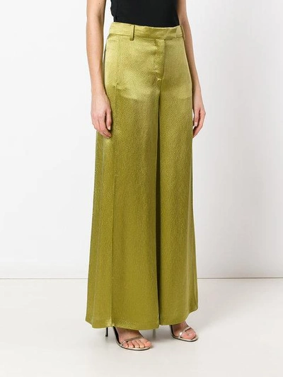 Shop Valentino Flared Trousers In Green