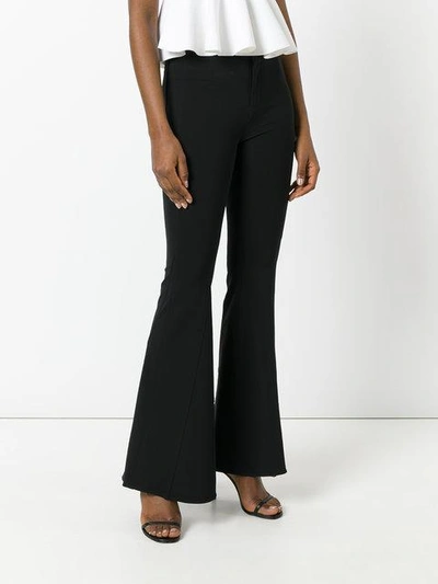 Shop Givenchy Fitted Flared Trousers - Black