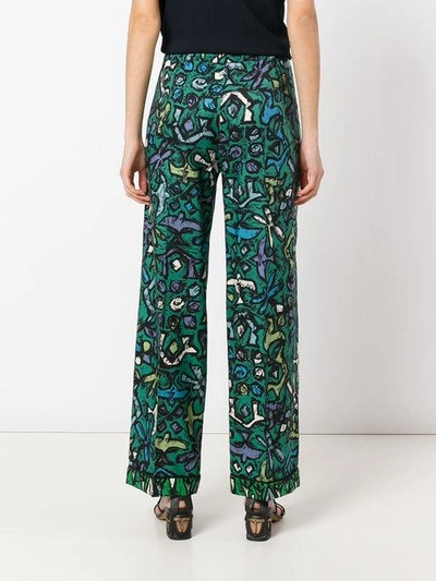 Shop Valentino Abstract Print Flared Trousers