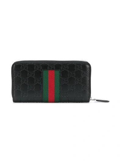Shop Gucci Signature Web Zip-around Wallet In Black