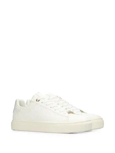 MONOGRAM-EMBOSSED PLATFORM SNEAKERS