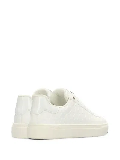 MONOGRAM-EMBOSSED PLATFORM SNEAKERS