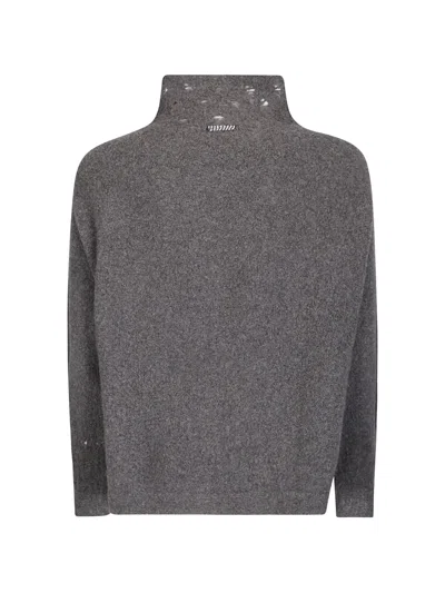 DISTRESSED BOUCLÉ SWEATER