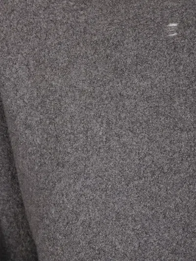 DISTRESSED BOUCLÉ SWEATER