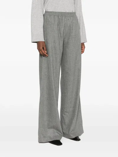 ELASTICATED-WAIST WIDE-LEG TROUSERS