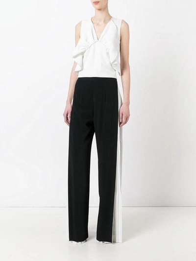 Shop Capucci Pleated Panel Trousers - Black