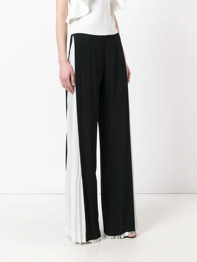 Shop Capucci Pleated Panel Trousers - Black
