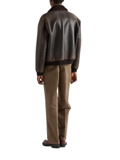 Prada Collared Long-sleeved Leather Jacket In Brown