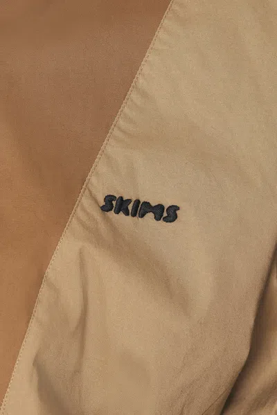 Skims Woven Cotton Half Zip Pullover In Brown