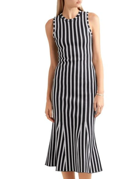 Shop Victoria Beckham Fluted Ribbed Striped Cotton-blend Dress