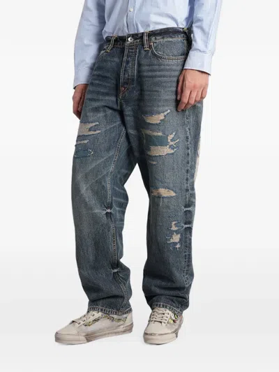 Evisu Distressed Patchwork Jeans In Blue