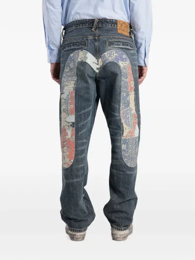 Evisu Distressed Patchwork Jeans In Blue