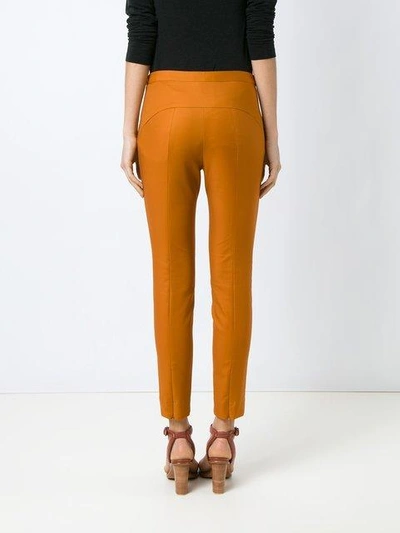 Shop Andrea Marques Skinny Trousers - Yellow & Orange