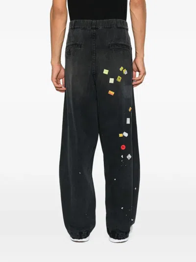 Miharayasuhiro Patchwork Ticket-print Jeans In Black