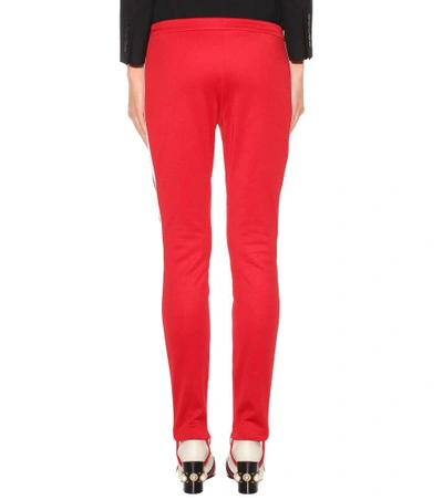 Shop Gucci Striped Cotton-blend Stirrup Trousers In Red