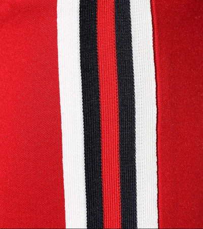 Shop Gucci Striped Cotton-blend Stirrup Trousers In Red