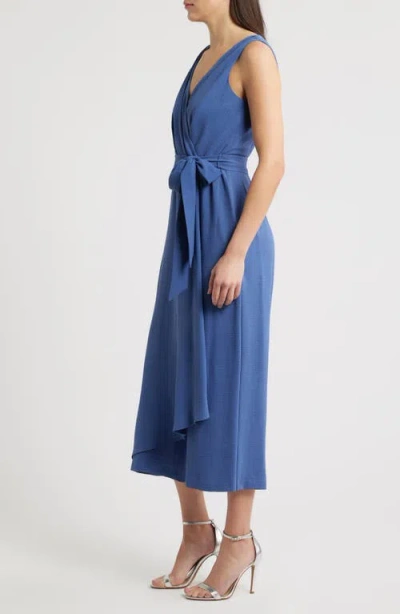 Connected Apparel Wrap Jumpsuit In Blue
