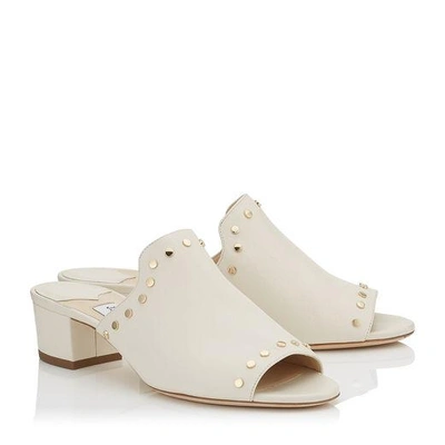 Shop Jimmy Choo Myla 35 White Nappa Leather Mules With Gold Studs In White/gold