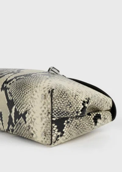 Totême T-lock Python-embossed Clutch Black/ecru In Black/ecru