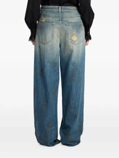 Ann Demeulemeester Distressed Script-print Jeans In Blue