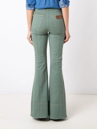 Shop Amapô High Waist Flared Jeans - Green