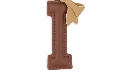 Leith Bow Initial Bag Charm In Brown