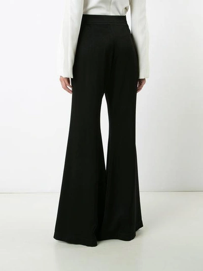 Shop Ellery Super Flared Trousers - Black