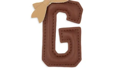Leith Bow Initial Bag Charm In Brown