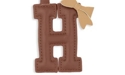Leith Bow Initial Bag Charm In Brown