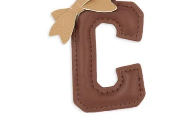 Leith Bow Initial Bag Charm In Brown