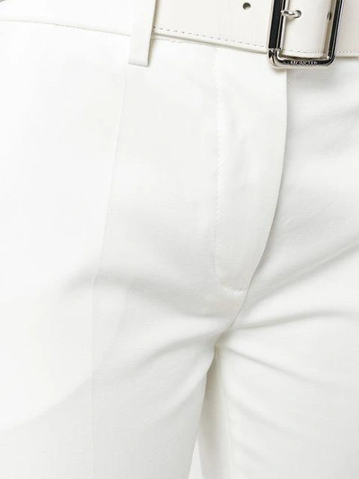 Shop Moncler Cropped Belted Trousers - White