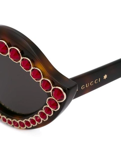 Shop Gucci Eyewear Studded Cat Eye Sunglasses - Brown