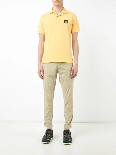 Shop Stone Island Logo Patch Polo Shirt In Yellow & Orange