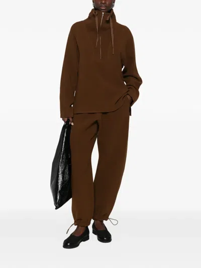 Studio Nicholson Drawstring Trousers In Brown