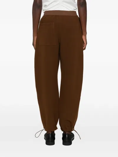 Studio Nicholson Drawstring Trousers In Brown