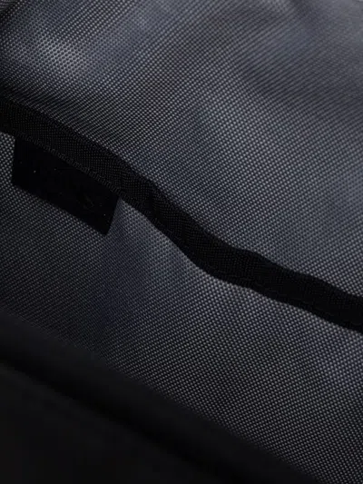 Rains Otaru Zip-pocket Matte-finish Backpack In Black