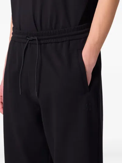 Msgm Logo-embroidered Drawstring Track Pants In Black
