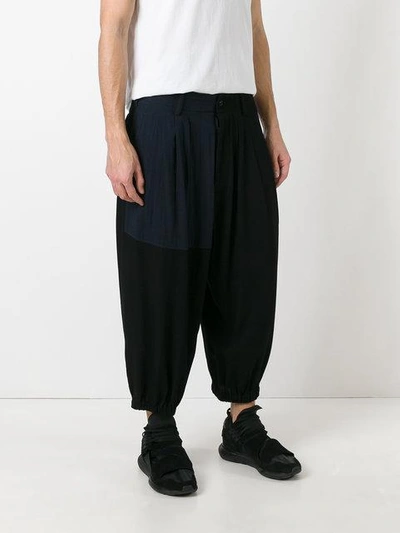 Shop Yohji Yamamoto Cropped Drop-crotch Trousers - Black