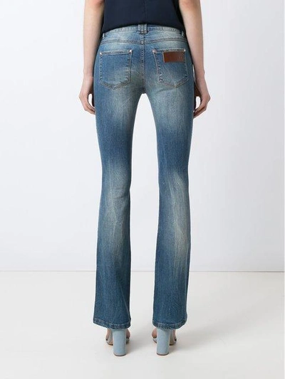 distressed flared jeans