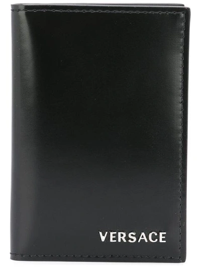 Shop Versace Foldover Cardholder In Black