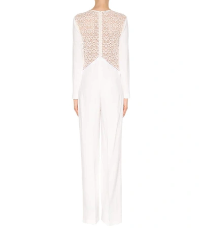 Shop Stella Mccartney Lace-panelled Crêpe Jumpsuit In Pure White