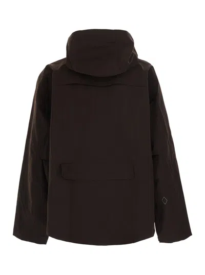 Pas Normal Studios Hooded Logo-print Jacket In Brown