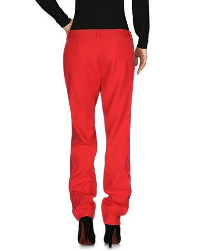 Shop John Galliano Casual Pants In Red