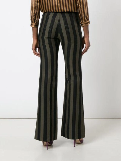 Shop Nina Ricci Striped Flared Trousers