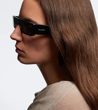 Alaïa Lettering Logo Rectangular Sunglasses In Black