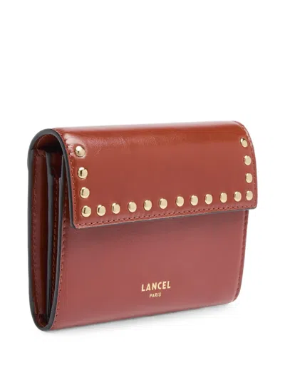 Lancel Studs Leather Wallet In Brown