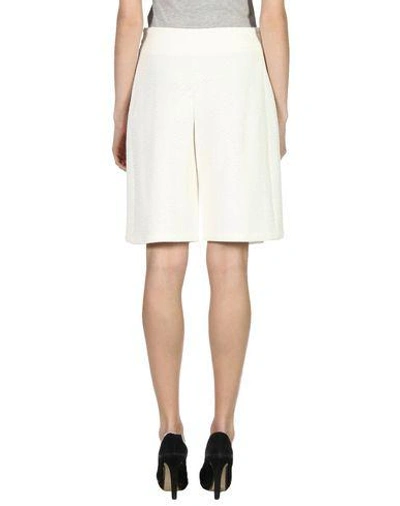 Shop Emporio Armani Shorts & Bermuda Shorts In White