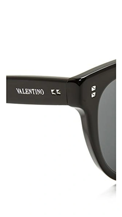 Shop Valentino Rockstud Rivets Sunglasses In Black/grey