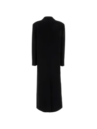 Le Sully Studio Double-breasted Wool Coat In Black