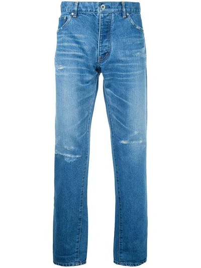 Shop Taakk Tapered Cropped Jeans In Blue